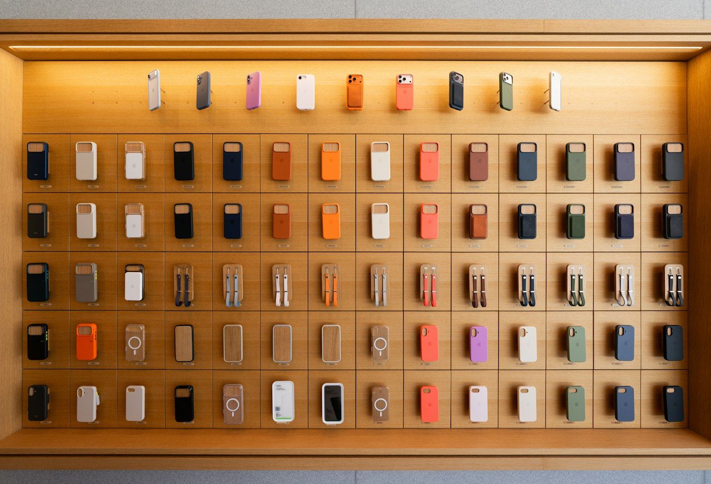 Phone accessories displayed on a retail wall